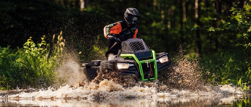 ATV going through water